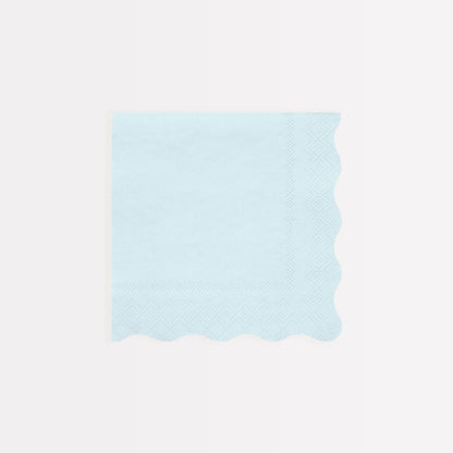 Four Ladurée Paris Assorted Napkins with scalloped borders from Meri Meri.