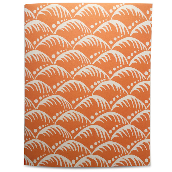 Five colorful Cambridge Imprint Blank Notebooks with patterned covers and three pencils on a marble surface.