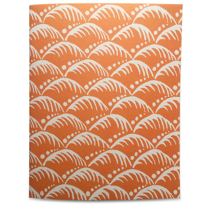 Five colorful Cambridge Imprint Blank Notebooks with patterned covers and three pencils on a marble surface.