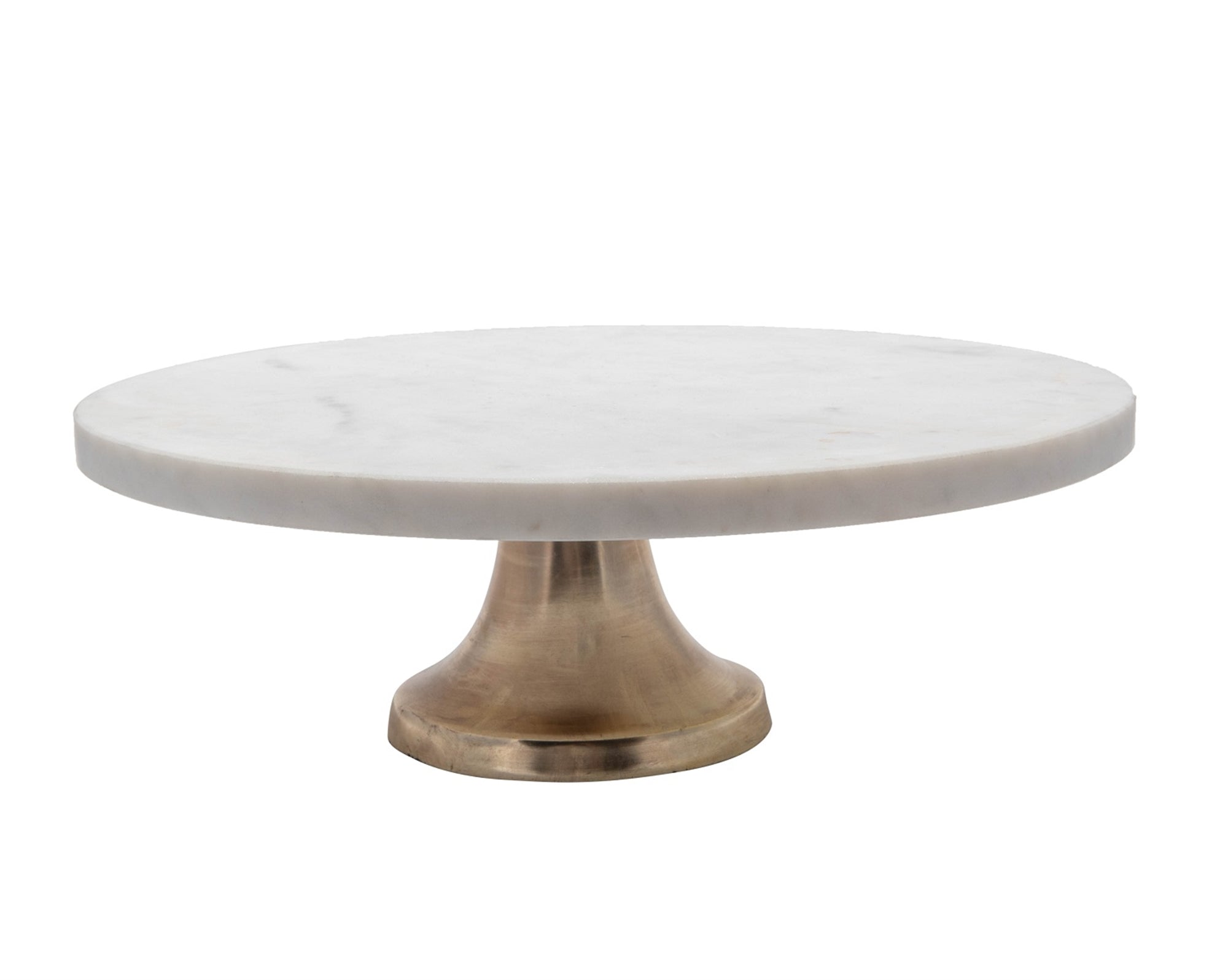 A bouquet of white hydrangeas in a white vase on a Bidk Home Marble Cake Plate with Antique Brass Base with decorative tables and a textured background.