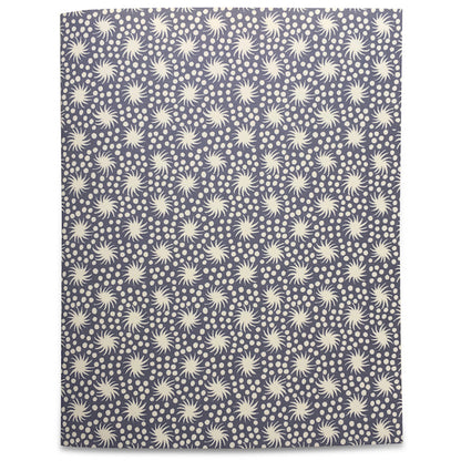 Five colorful Cambridge Imprint Blank Notebooks with patterned covers and three pencils on a marble surface.