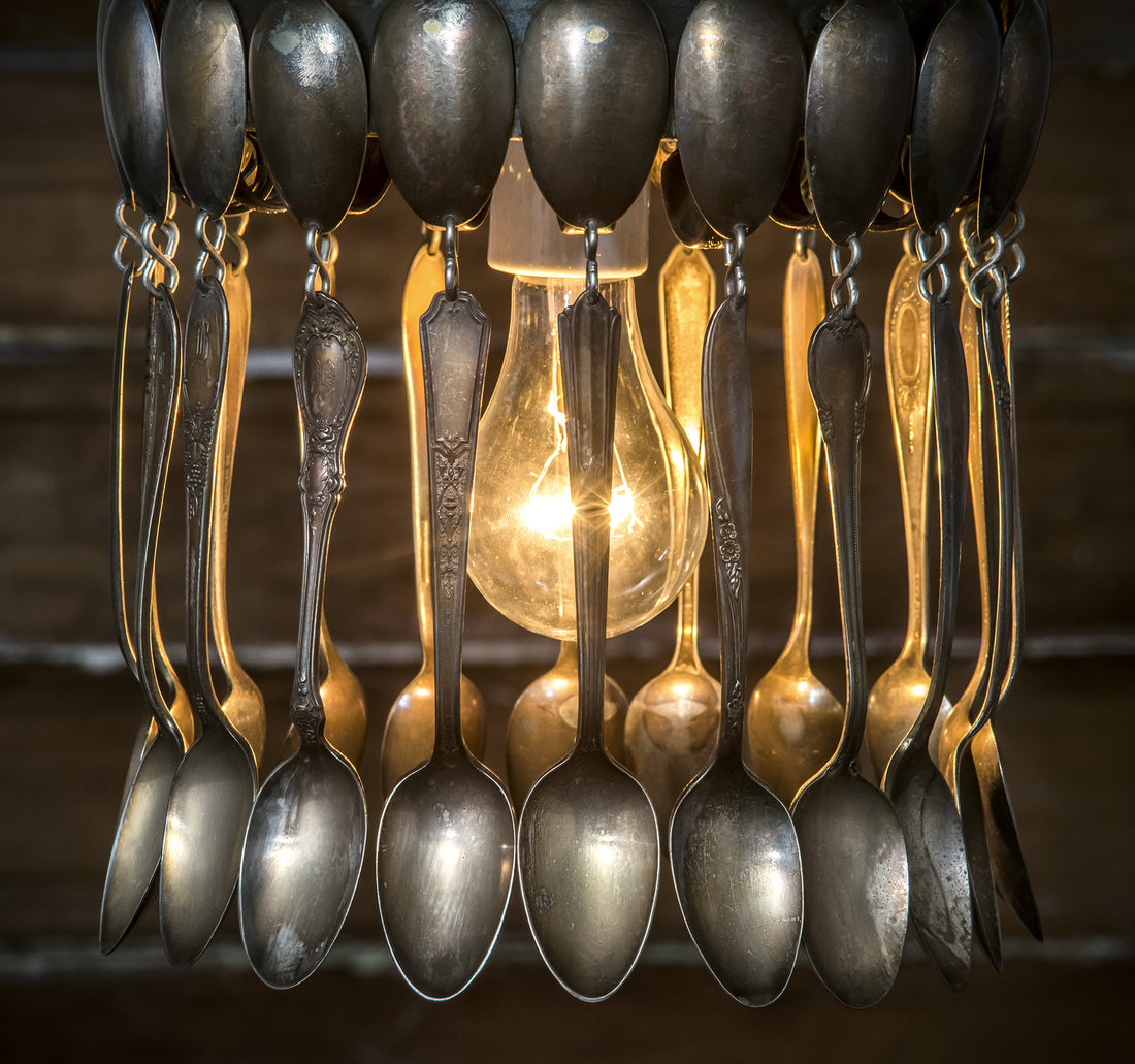 A hand-crafted Spoon Pendant Light made of vintage spoons hanging from a chain by Hester &amp; Cook.