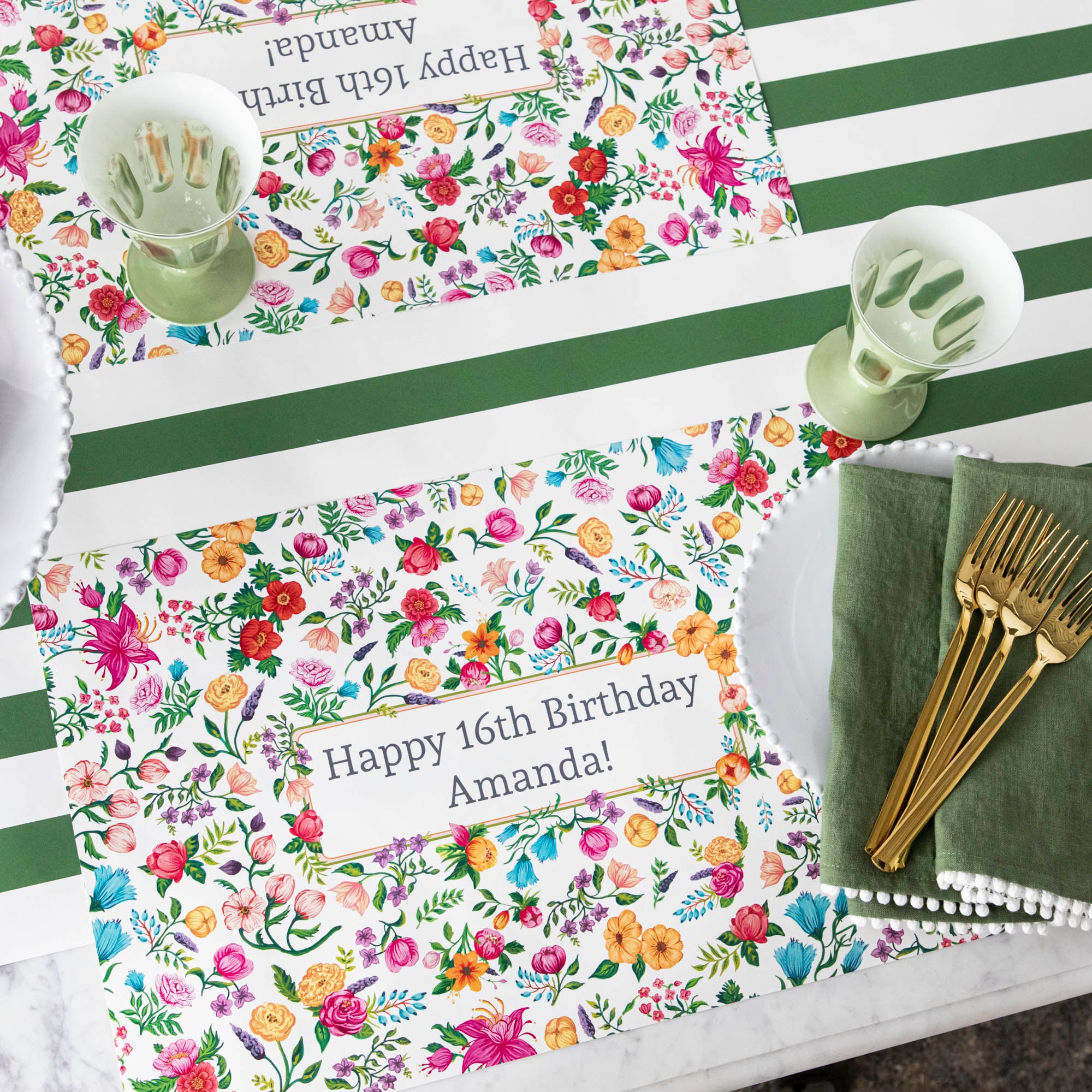 The Sweet garden Personalized Placemat in an elegant table setting, with &quot;Happy 16th Birthday Amanda!&quot; printed in the center.