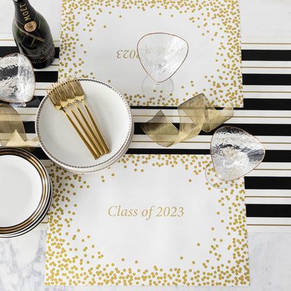 Table setting with Gold Confetti Placemat with personalized message printed in gold color: &quot;Class of 2023&quot;.