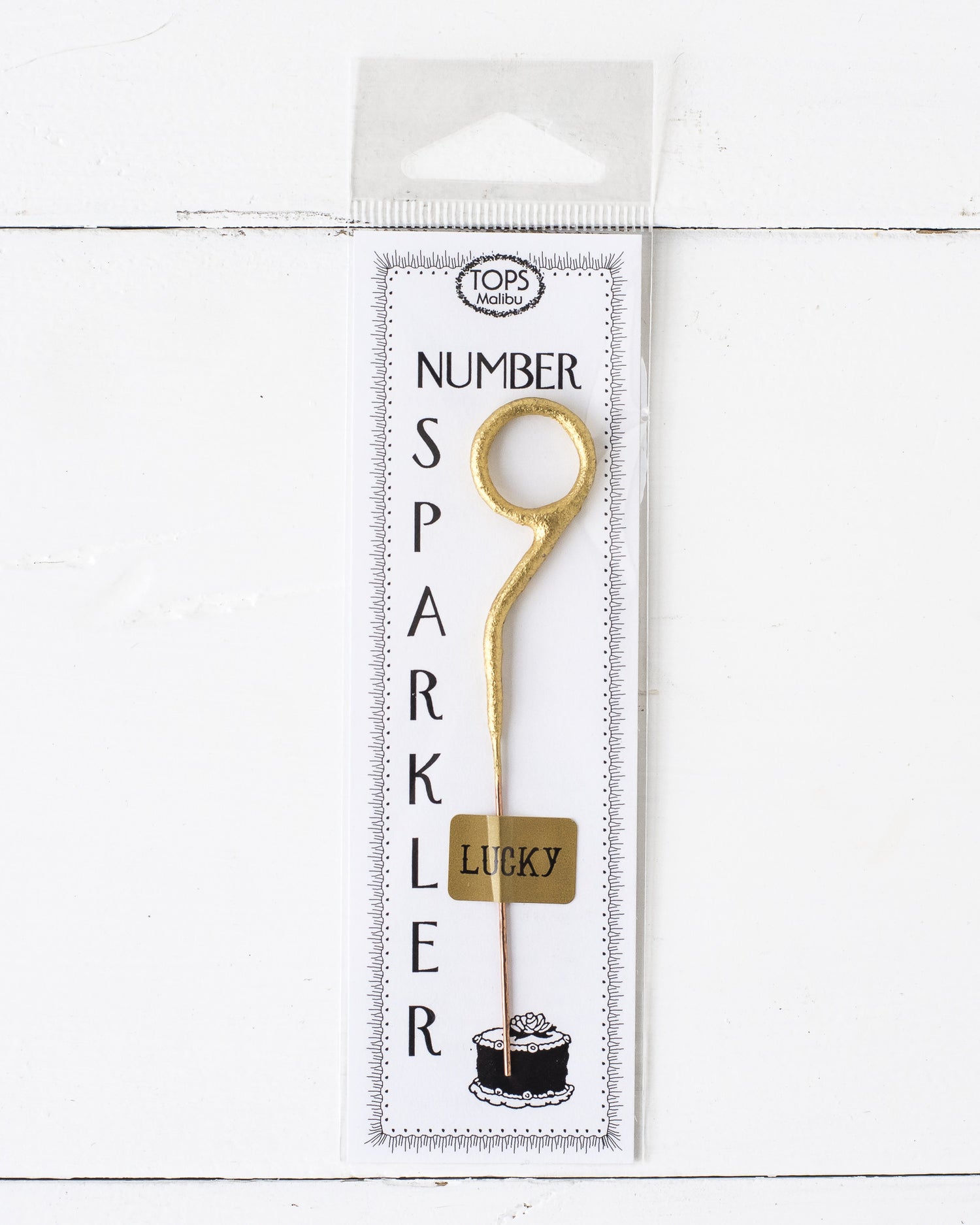 A 4&quot; tall Gold Number Cake Topper Sparkler from Tops Malibu that instantly brings the party.