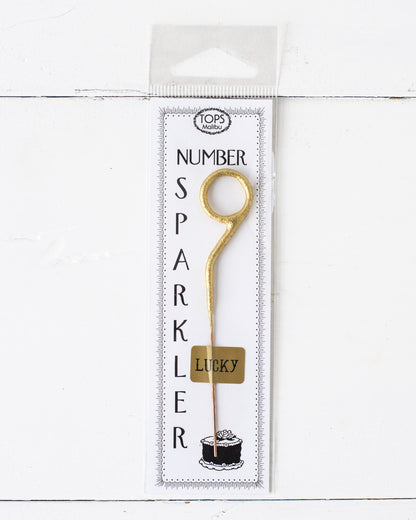 A 4&quot; tall Gold Number Cake Topper Sparkler from Tops Malibu that instantly brings the party.
