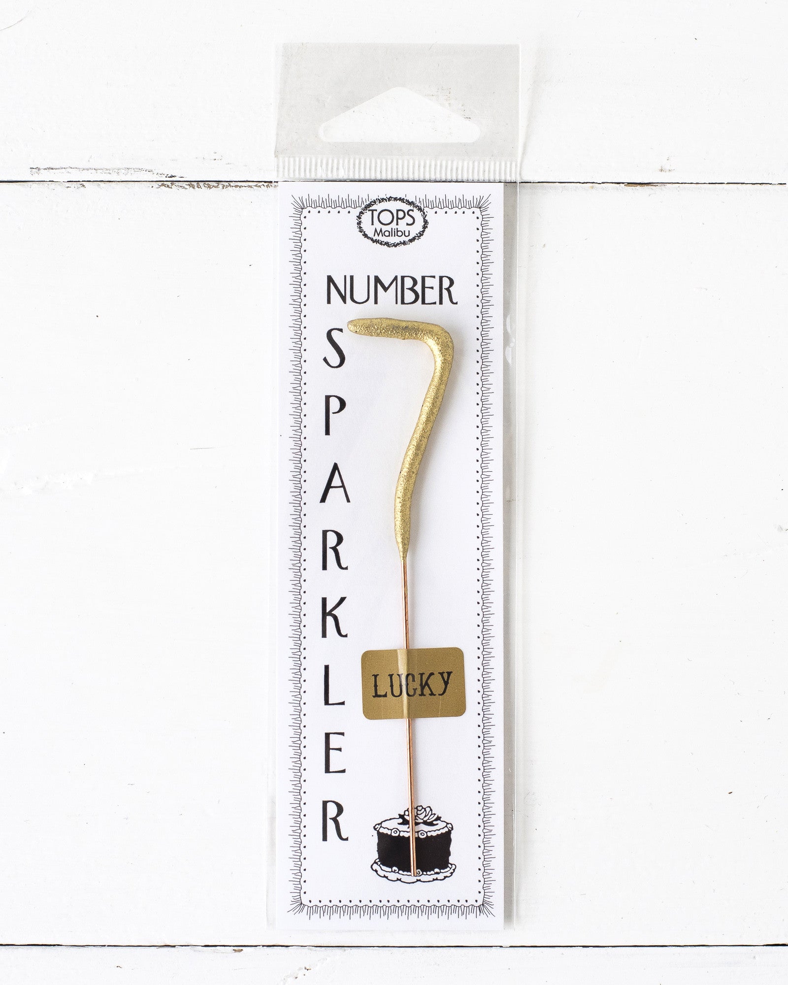 A 4&quot; tall Gold Number Cake Topper Sparkler on a white background, manufactured by Tops Malibu.