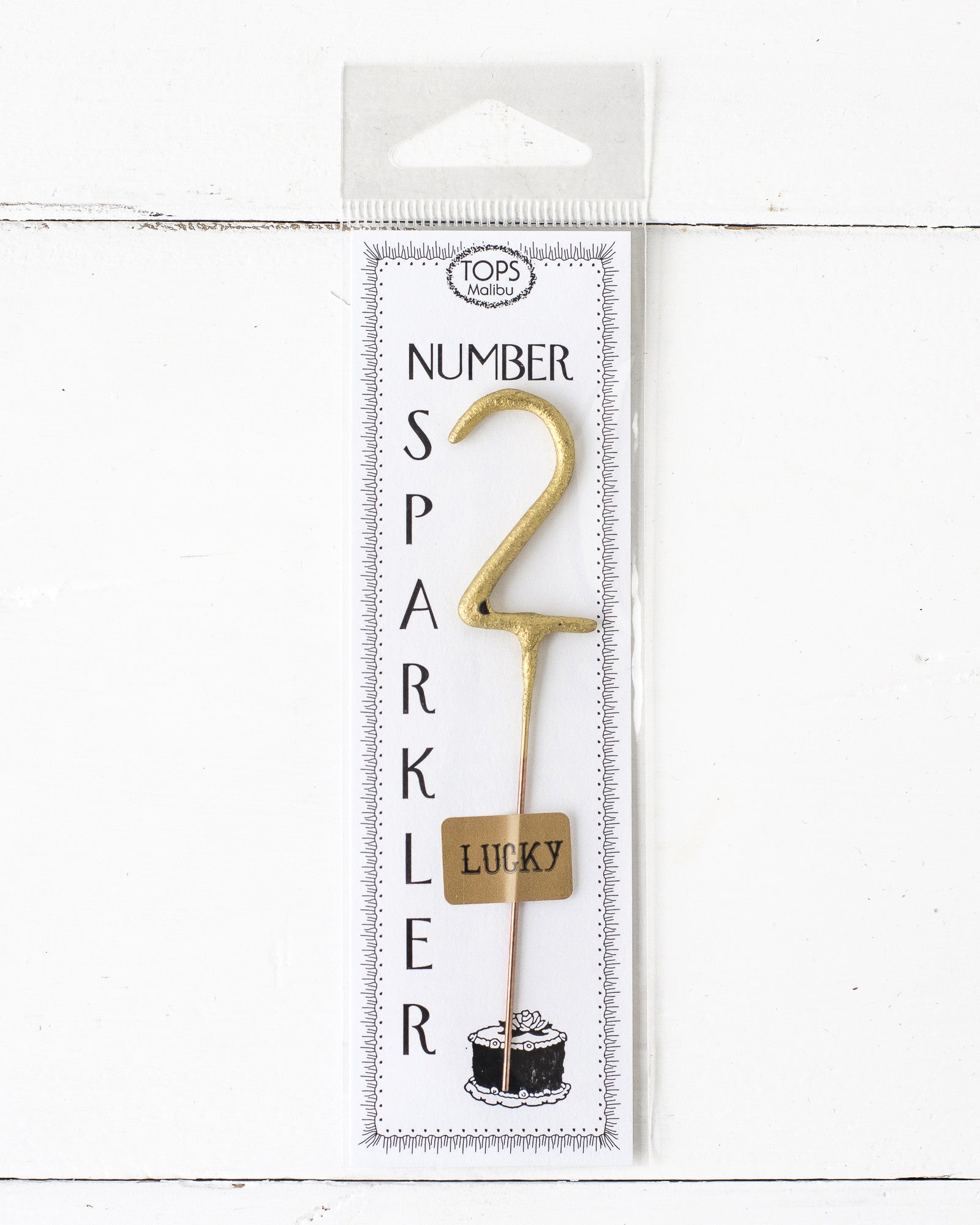 An instant party package featuring a 4&quot; tall Gold Number Cake Topper Sparklers from Tops Malibu.
