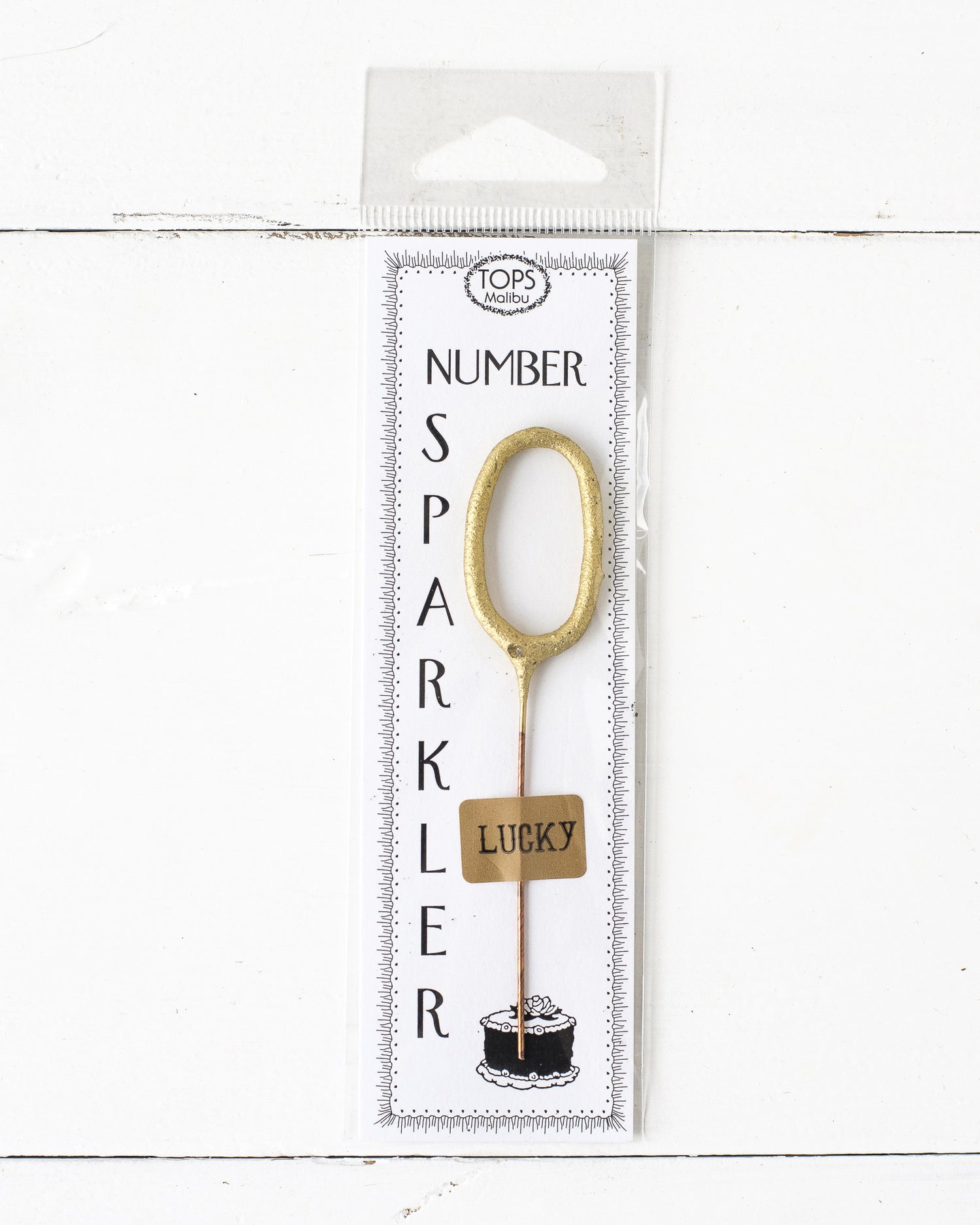 A 4&quot; tall Gold Number Cake Topper Sparkler packaged for an instant party by Tops Malibu.