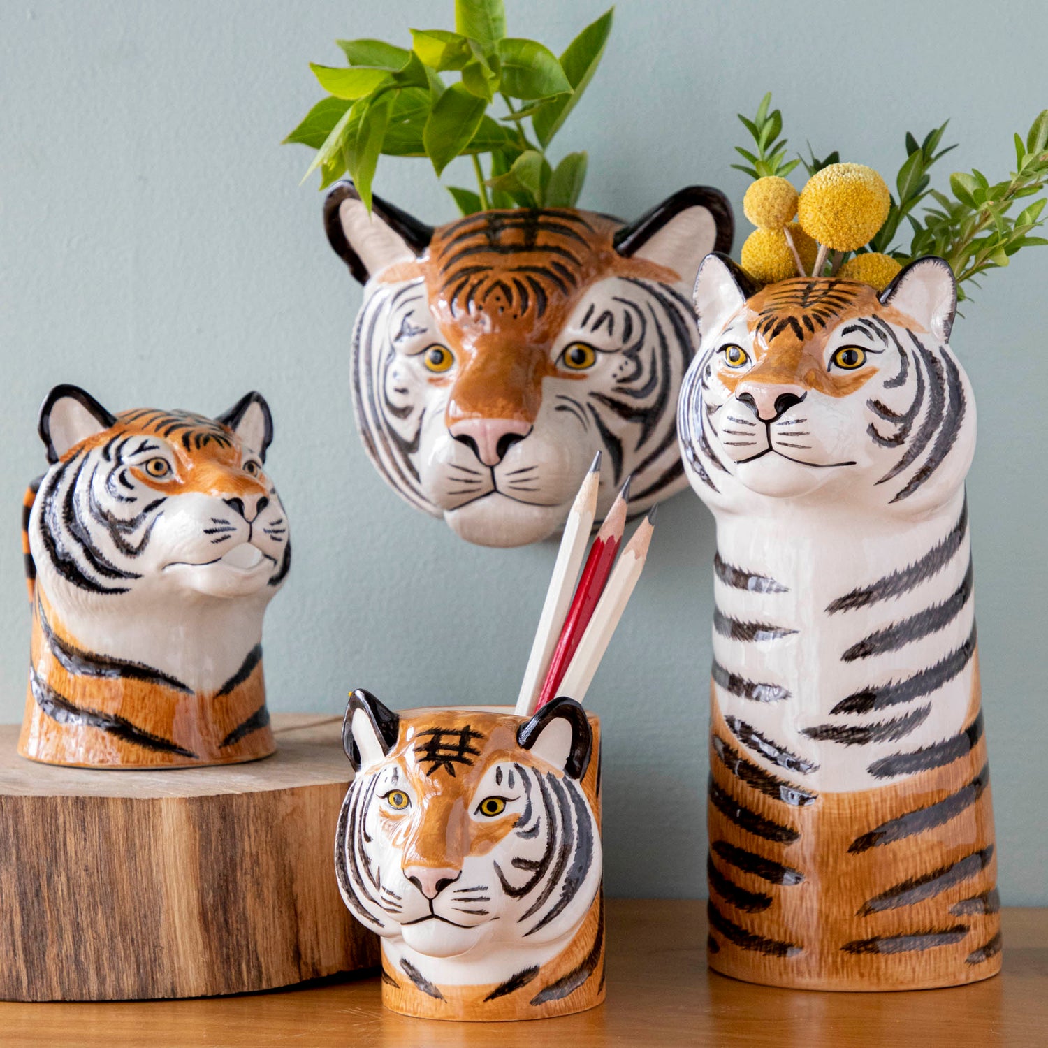 A set of Tiger Ceramic vases by Quail, displayed on a table.