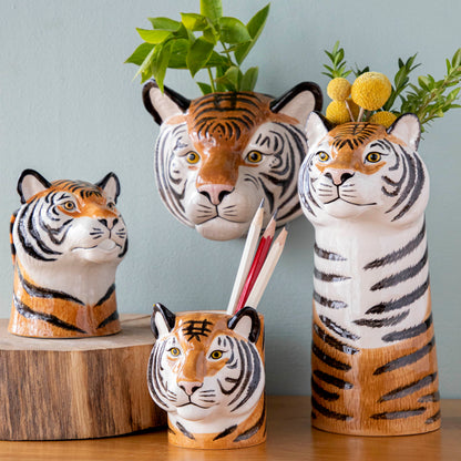 A set of Tiger Ceramic vases by Quail, displayed on a table.