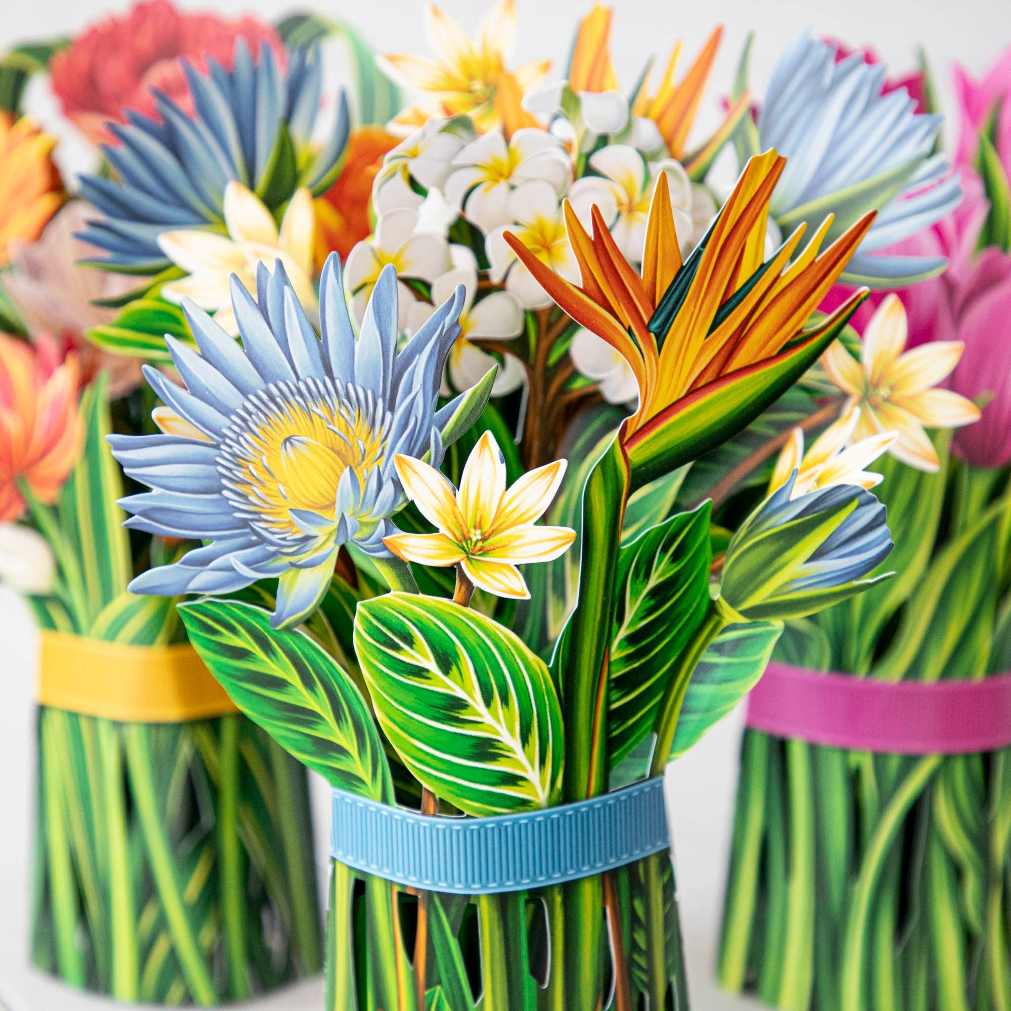 A bunch of Summer Flower Bouquet from Fresh Cut Paper in a vase.