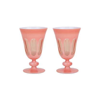 A set of four Rialto Salmon Glasses by SIR/MADAM on a white surface.