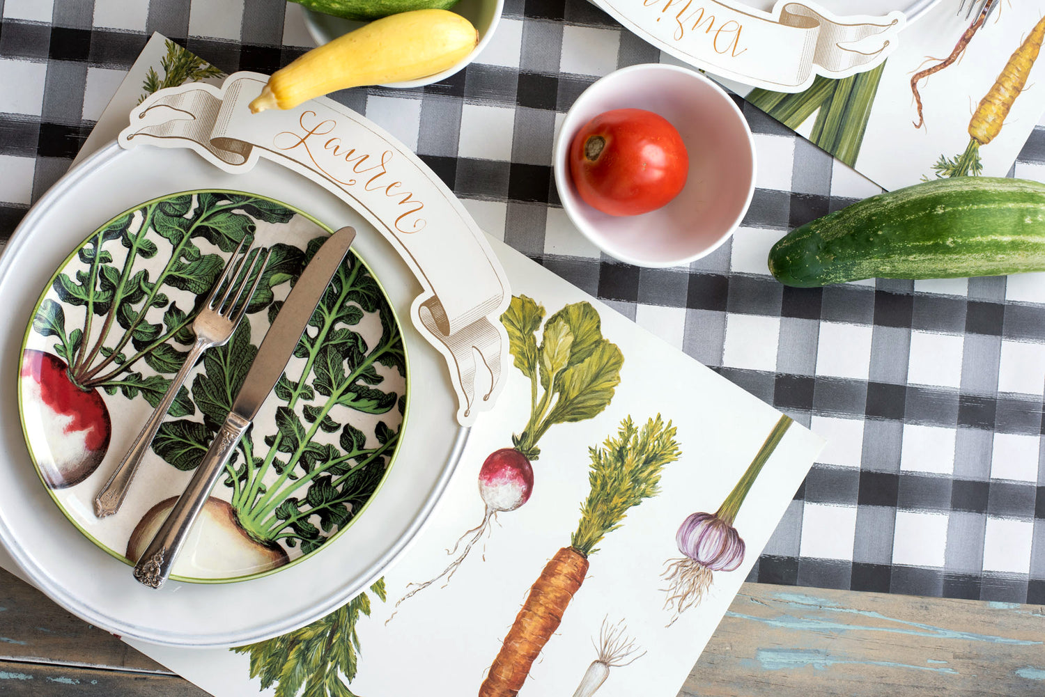 The Black Painted Check Runner under an elegant vegetable-themed table setting.