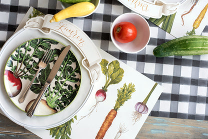 The Black Painted Check Runner under an elegant vegetable-themed table setting.