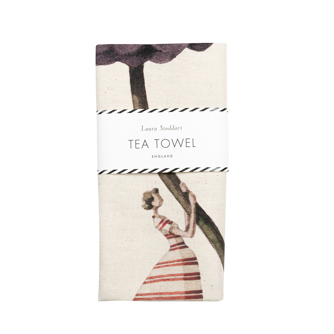The Laura Stoddart Tea Towel in retail packaging, neatly folded with a white paper belly band.