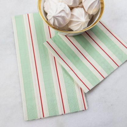 Two Seafoam &amp; Red Awning Stripe Napkins, one Guest and one Cocktail, under a bowl of treats.