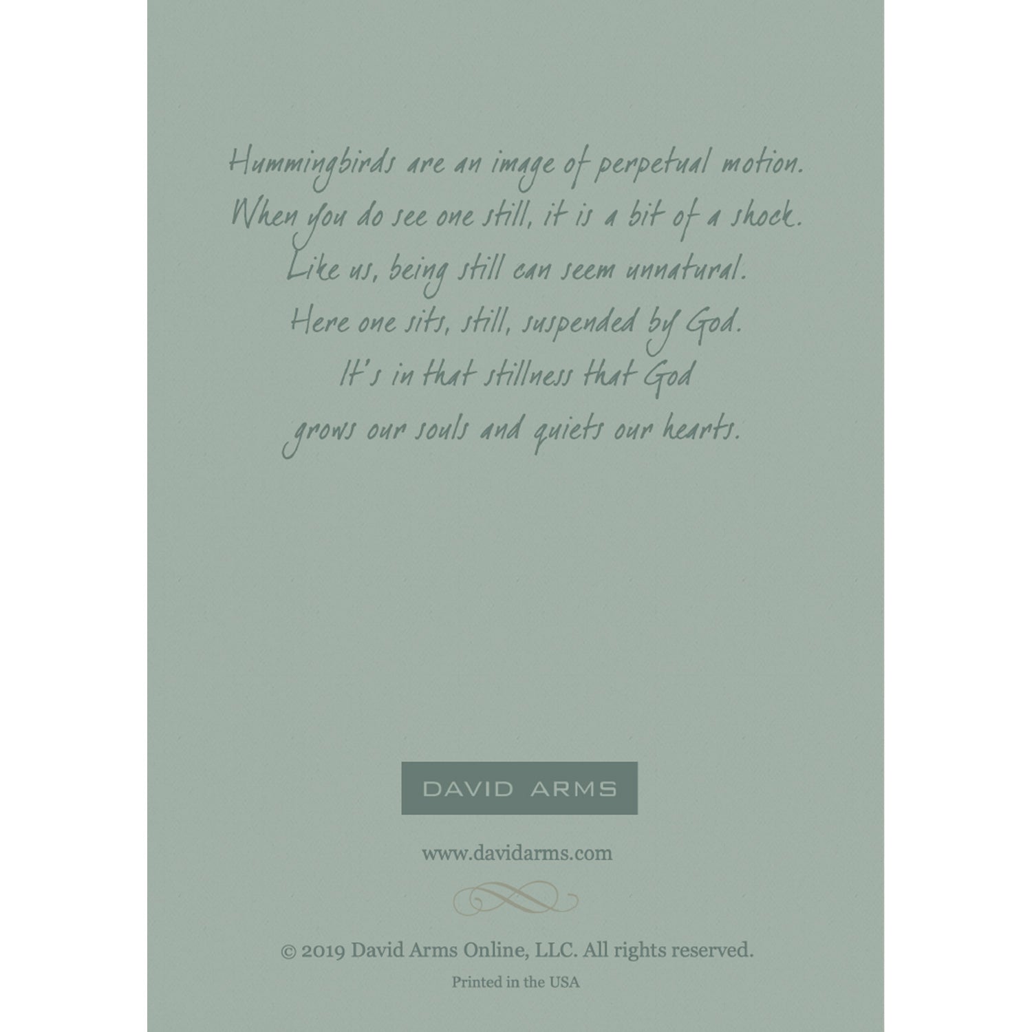 The sage green back side of the greeding card, featuring a quote from artist David Arms.
