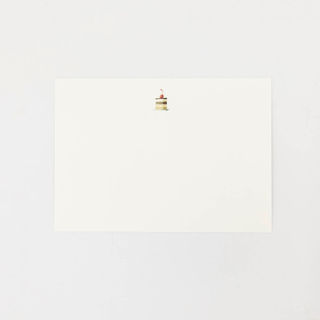 The back of the Cakes Flat Notes card is white with a small illustrated cake slice at the top. 