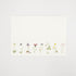 A white note card featuring a row of illustrated wildflowers across the bottom of the card, and a woman holding a rake. 