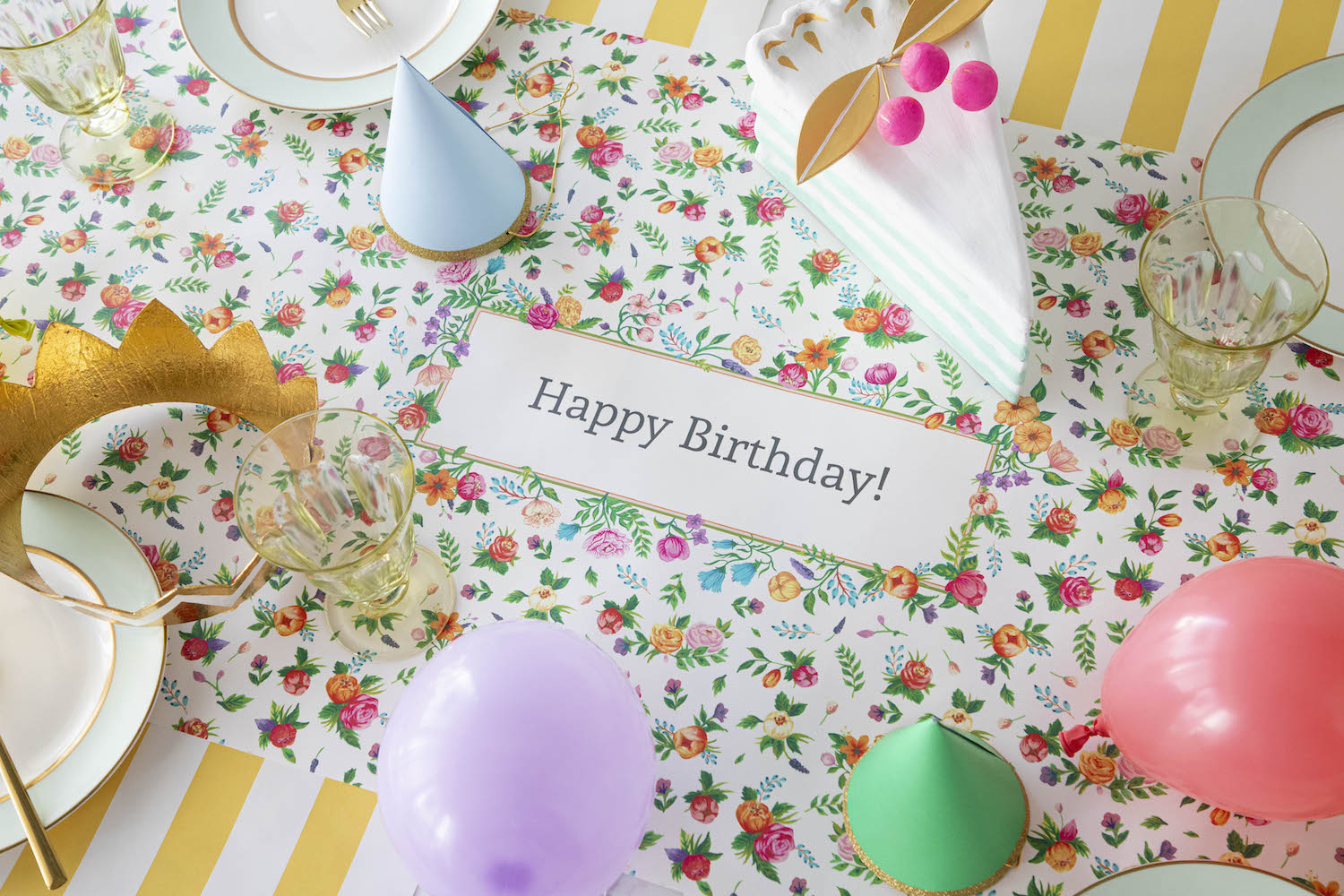 The Sweet Garden Personalized Runner under an elegant Birthday tablescape, with &quot;Happy Birthday!&quot; printed in the middle.