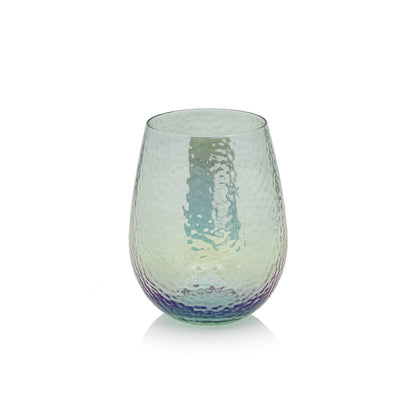 A vibrant Luster Stemless Glassware, perfect for serving drinks at home, with a mesmerizing green, blue, and purple color from Zodax.
