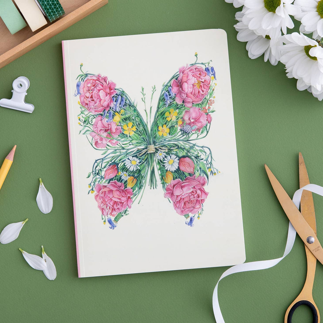 A Butterfly Perfect Bound Notebook with a butterfly and flowers on it, crafted by British papermakers on luxury cream stock by The DM Collection.