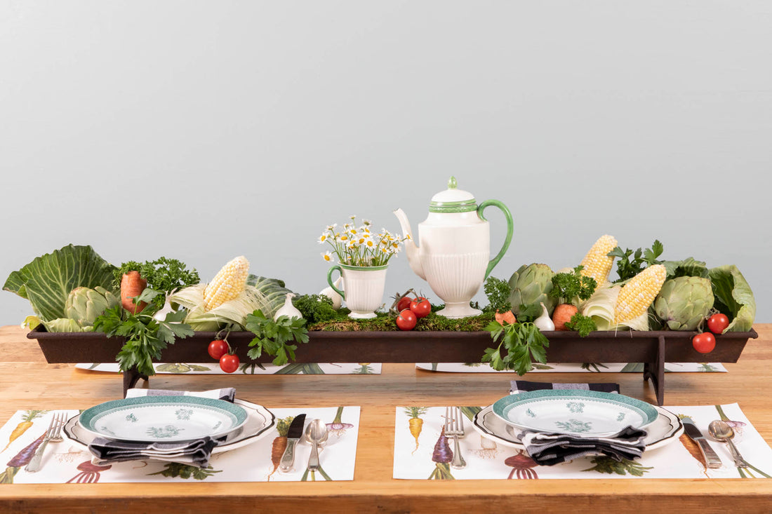 A table with a tray of vegetables on it, featuring a Park Hill Chicken Feeder Centerpiece in rustic style as the centerpiece.