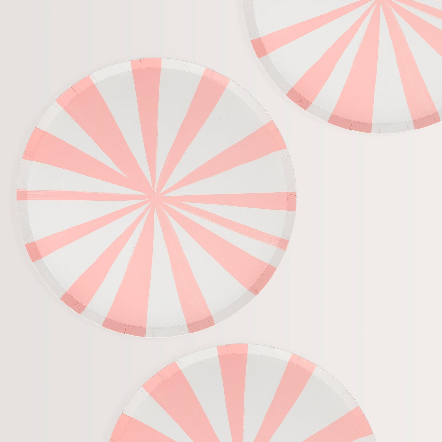 A Meri Meri Pink Stripe Plate, perfect for an eco-friendly party table.
