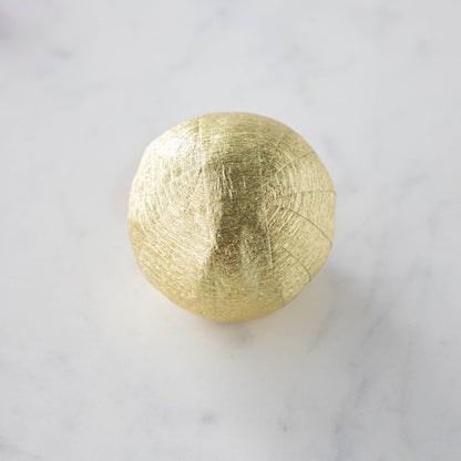 Vintage-inspired Mini Surprize Balls in a white bowl with confetti by Tops Malibu.