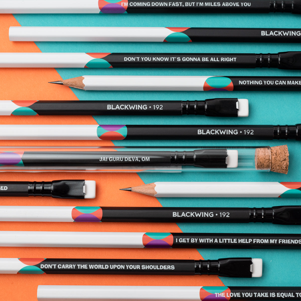 A group of Blackwing Volume 192- Tribute to John Lennon and Paul McCartney (Set of 12) colored pencils with a quote on them about songwriting by John Lennon and Paul McCartney.